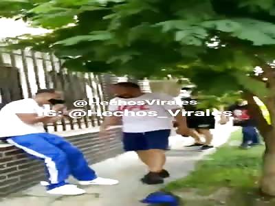 Thief gets beating by angry crowd.