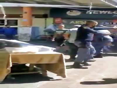 Police officers came under attack and fired warning shots 