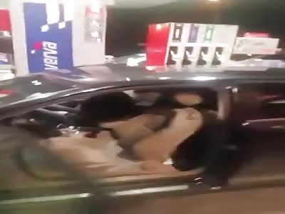 Peaceful lady at gas station