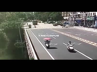 Big truck falls from a bridge into a river. 