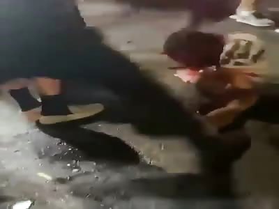 Israelis settlers attack a Palestinian