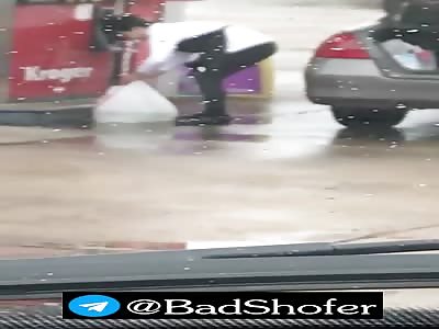 Asian woman steeling fuel using plastic bags 