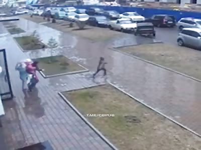 Little running boy hit  by speeding car