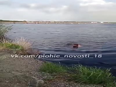 Dead body of young man found floating in a lake.