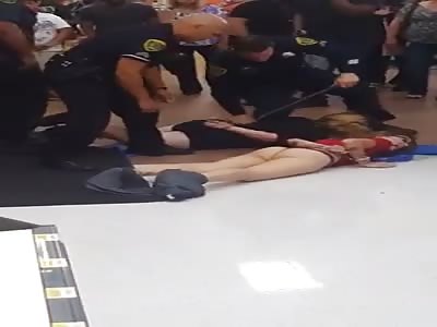 Ass out woman arrested in Walmart. 