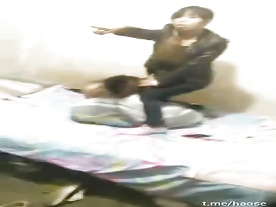 Angry wife beat the shit out of her husband's nude mistress.