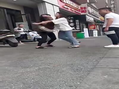 Chinese girl stabbed in front of her boyfriend by jealous girl 