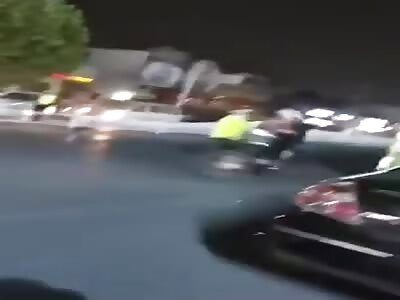 Chinese police stopping motorcycle 