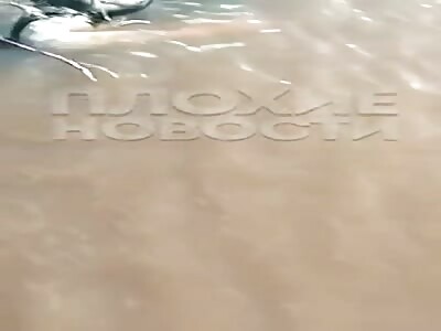 Dead body if Drowned man floating in river 