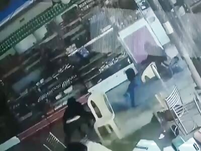 Rival executed by two gang members using machetes.