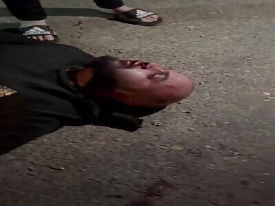 Sicario fail to kill his target run over by car and gets a bloody beat