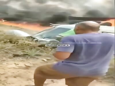 Pilot trapped in burning helicopter