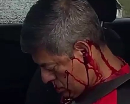 Executed by sicario in his car 