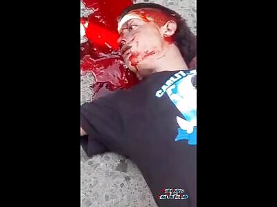 Two men, one bike, and too many guns