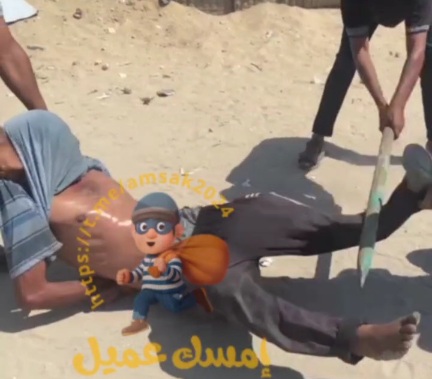 Thief captured and gets his leg smashed by qassami fighters 