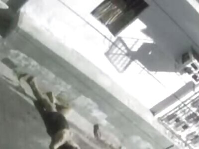 a Brazilian transvestite was thrown from the top of the building