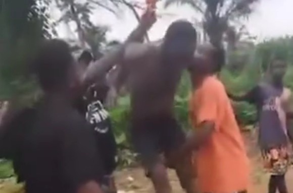 MAN BEING TORTURED IN 