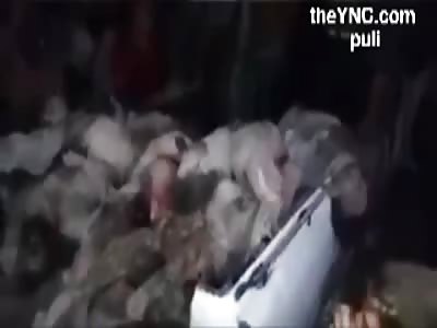 The bodies of Iraqi mercenaries nujaba movement after defeating the neighborhood of Sheikh Saeed in Aleppo