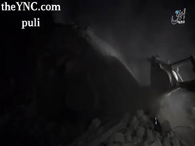 Extract the dead among the rubble died as a result of the Turkish aerial bombardment of the city 