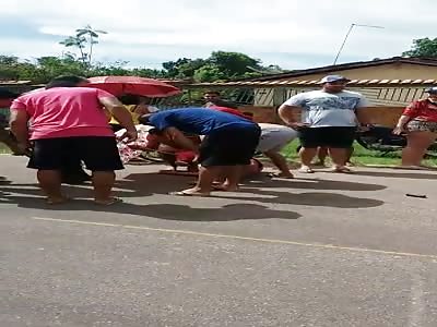 accident .. the little boy who is lying on the bicycle 