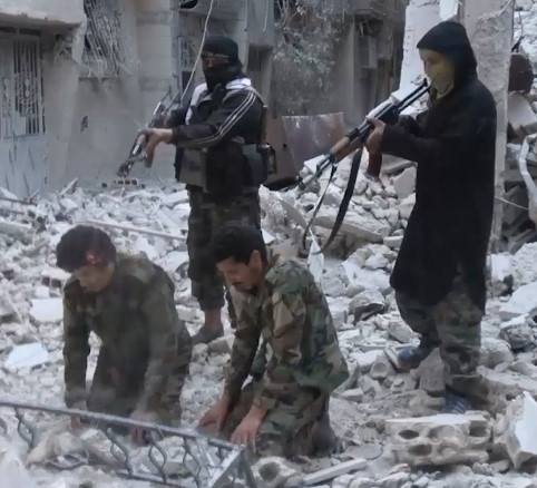 liquidation of two Syrian soldiers in the neighborhood standing south of Damascus