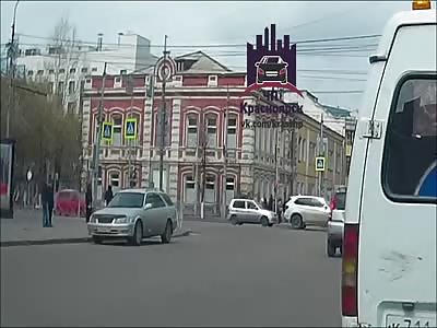 WOMAN IS HIT BY AUTOMOBILE