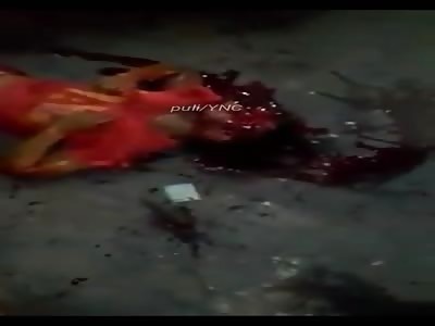 Man in agony bathed in blood