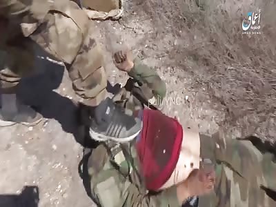 the scenes show the bodies of the Syrian soldiers and a tank destroyed