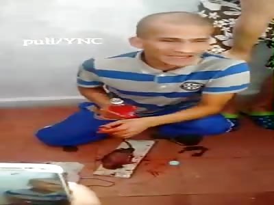 Wtf Man eats raw rat