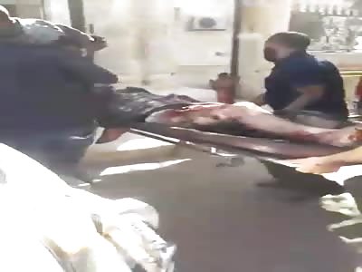 Several bodies of civilians were burned and dozens of people were inju