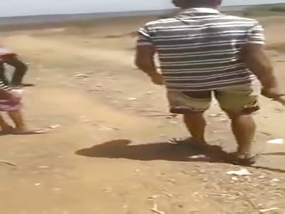 woman beaten by rival gang