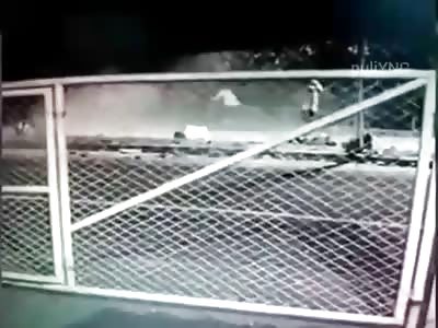 moment when two motorcyclists collide violently against a pole