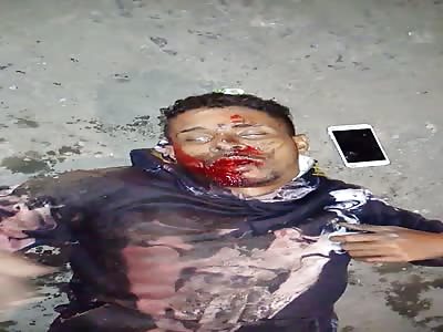 Dying man with head shot.