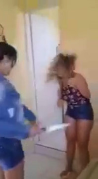 Betrayed Wife Beats Her Husband's Side Girl
