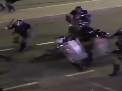 Police Brutally Beats a Guy That's Already on the Floor