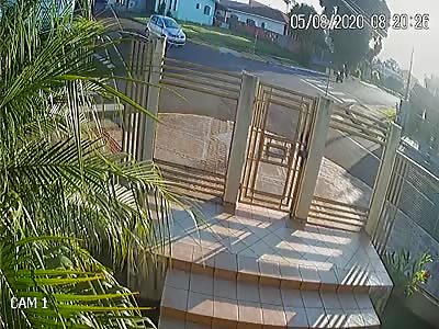 CCTV accident motorcyclist collides with car 