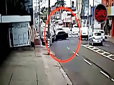 CCTV. Accident car vs motorcyclist {Aftermath}