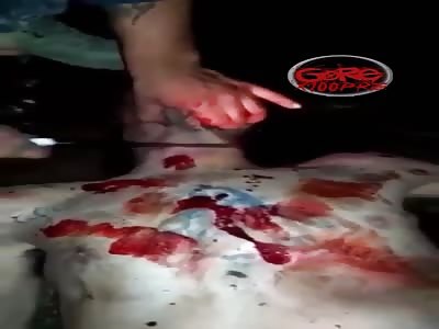 Slit Throat and Puddles of Blood