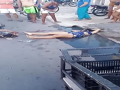 two people are murdered with multiple shots