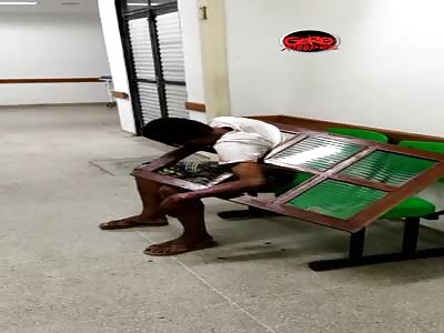 stupid thief gets trapped in a window