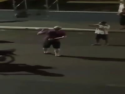 street fight where a man is attacked with a machete 