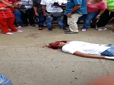 hitman, is brutally beaten after killing shopkeeper 