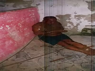 Tied hands man is brutally beaten.