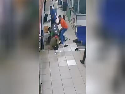 A person attempted to steal the security guard's weapon