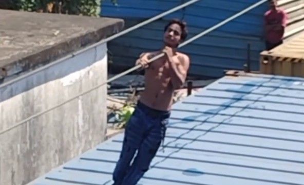 MAN BEING ELECTROCUTED ON A TRAIN