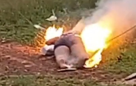 WOMAN BURNING IN ELECTRIC WIRE