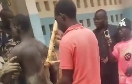 Pick axe to the back in job site dispute