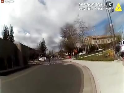 COP HAS GUN TAKEN FROM HIM AN SHOT AT HIM IN FOOT PURSUIT 