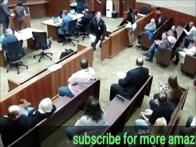 Man runs out of court an does the leap of faith off the second floor in to a marble floor