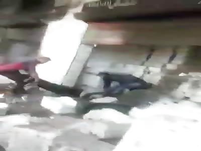 Loading Dead And Wounded Civilians Into 